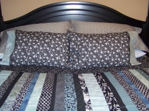 Pillow cases on the bed, companions for the quilt